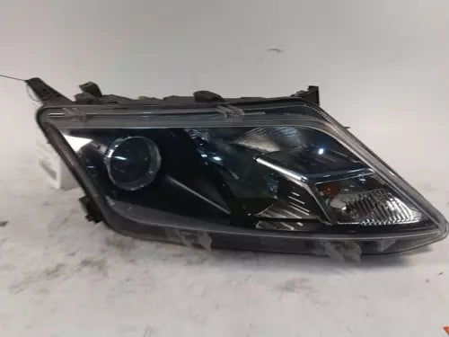 Used Right Headlight Assembly fits: 2012 Ford Fusion bi-functional halogen Right